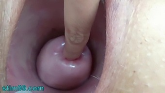 Asian Woman Indulges In Extreme Self-Stimulation With Nettles And Rod Flowers