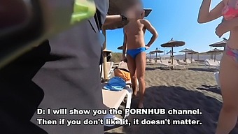 Amateur Girl Engages In Oral Sex With Stranger On Nudist Beach While Being Watched By Old Men