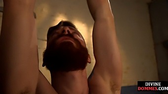 A Voluptuous Female Dominant Uses A Strapon To Penetrate Her Submissive'S Rear After A Whipping Session